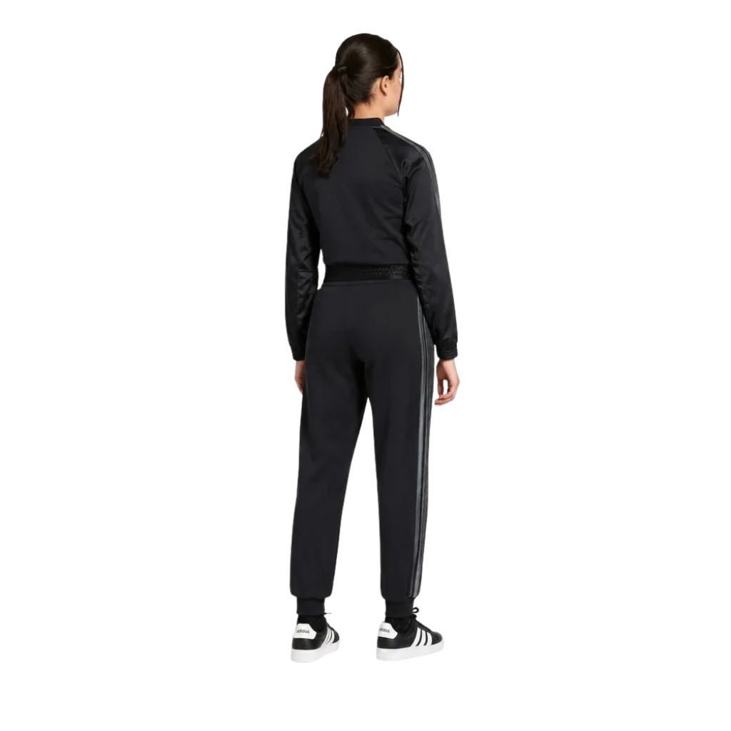 Tuta Adidas nera con giacca bomber corta e pantaloni con bande grigie