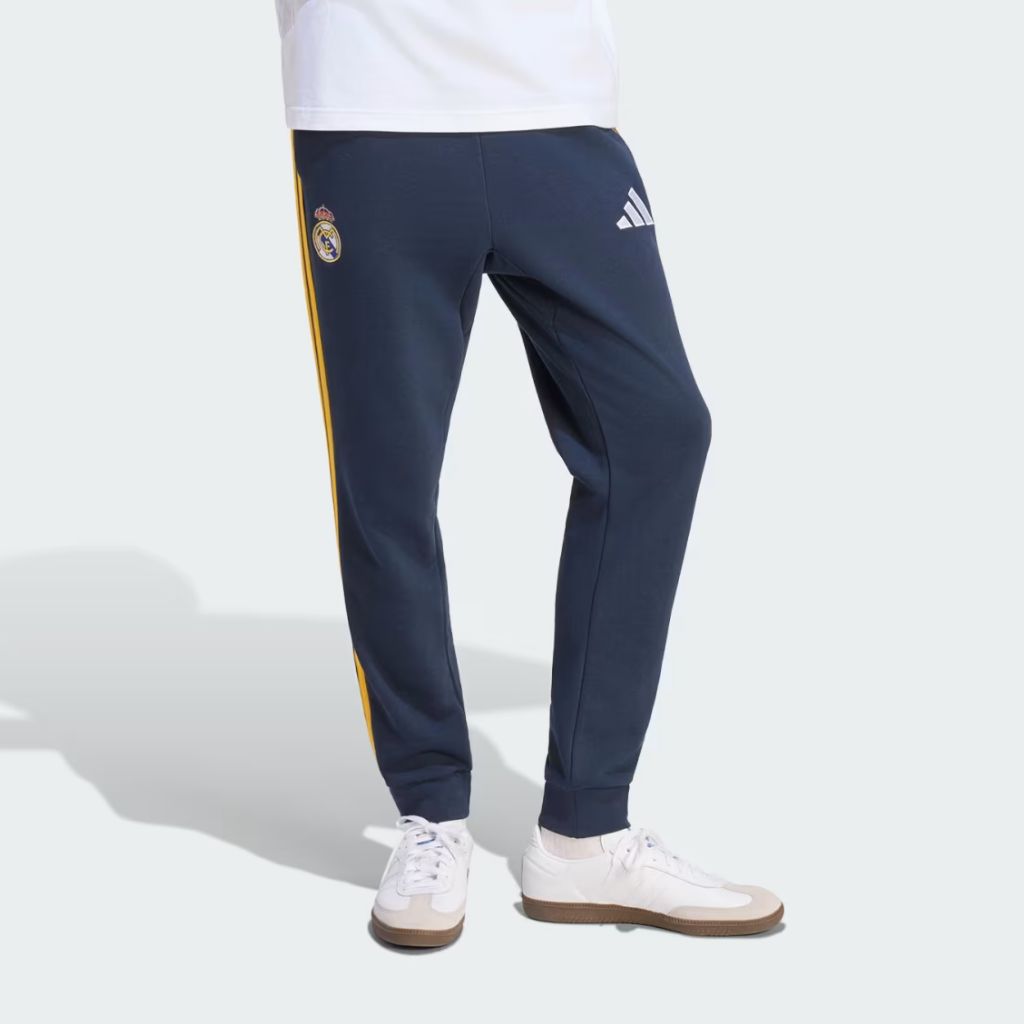 Pantaloni Adidas Real Madrid blu navy con bande gialle e polsino