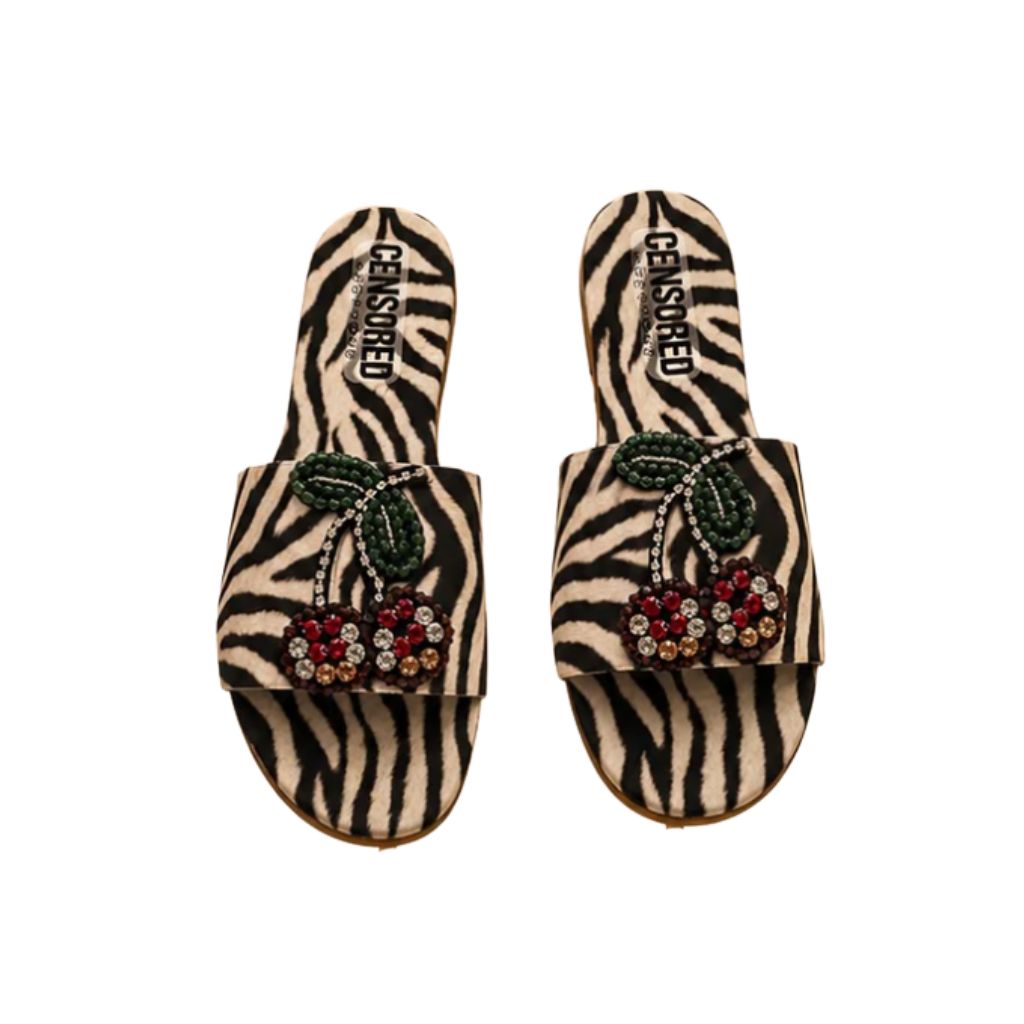 Ciabatta flat donna zebrata con patch ciliegie in perline e strass multicolor.
