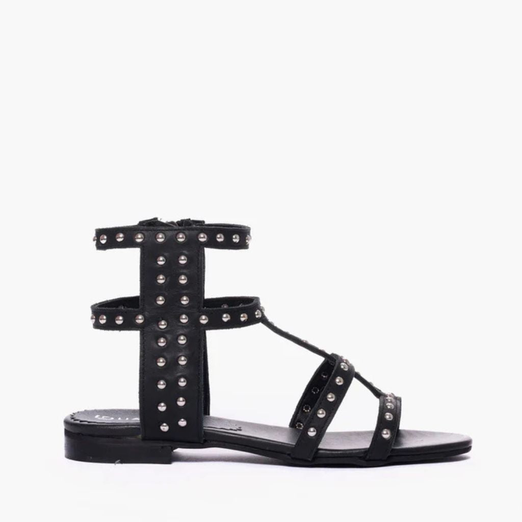 Sandalo gladiator Gagliotta in pelle nera, micro borchie argentate a griglia, chiusura zip.