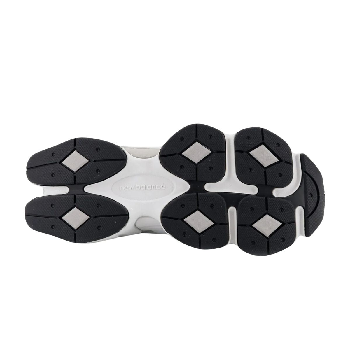 Sneaker New Balance 9060 bianca con tomaia in mesh e materiale gommato, intersuola ammortizzata ABZORB e iconico logo "N" laterale.