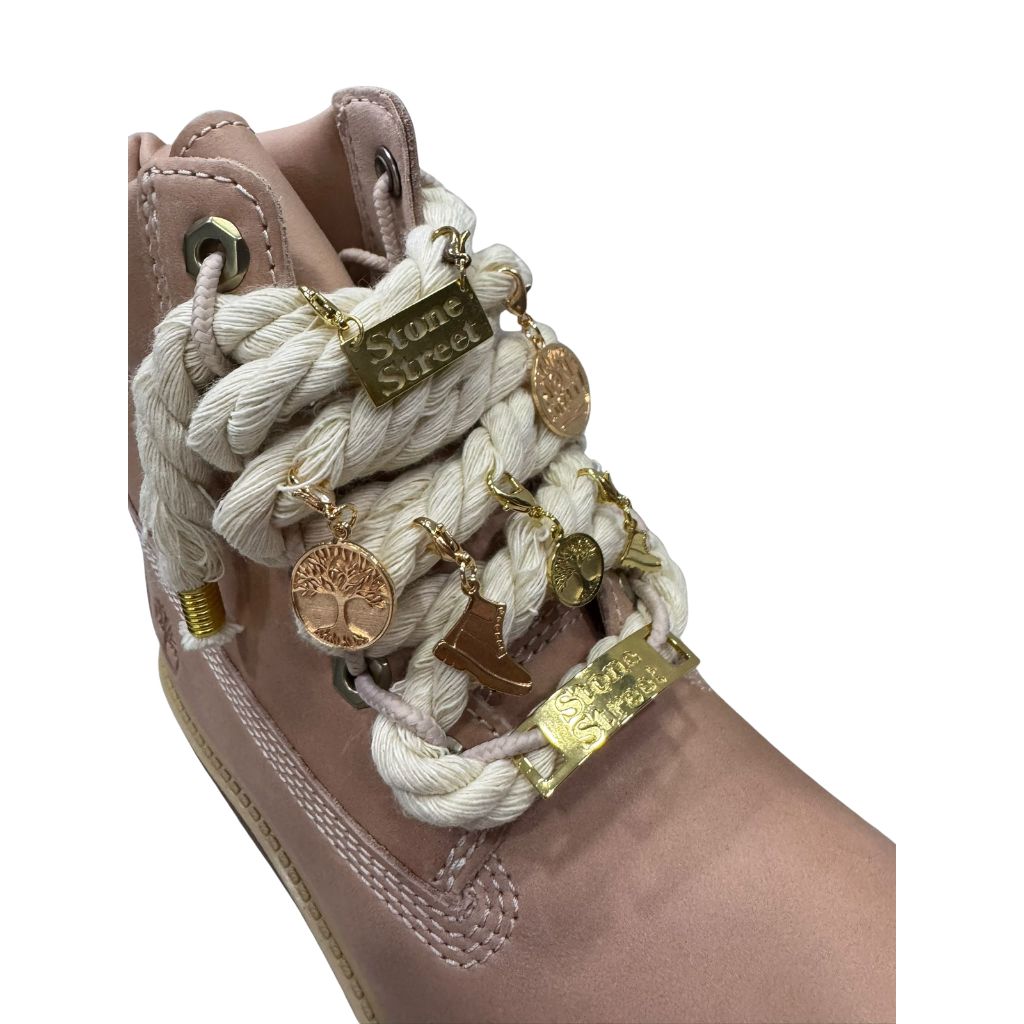 Scarponcino Timberland Stone Street rosa con lacci a corda e charms