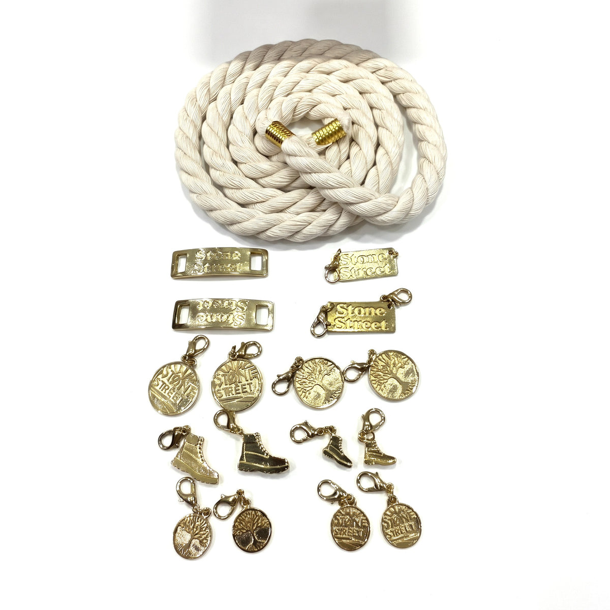 Kit Fai Da Te Timberland: lacci in corda beige, placchette Stone Street e charms oro