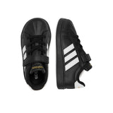 Sneakers adidas nere da bambino con tre strisce bianche e strappo