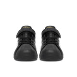 Sneakers adidas nere da bambino con tre strisce bianche e strappo