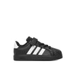 Sneakers adidas nere da bambino con tre strisce bianche e strappo