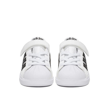 Sneakers adidas bianche da bambino con tre strisce nere e strappo