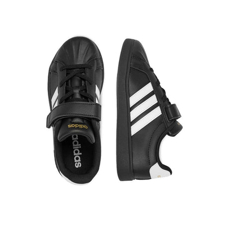 Sneakers adidas nere da bambino con tre strisce bianche e strappo