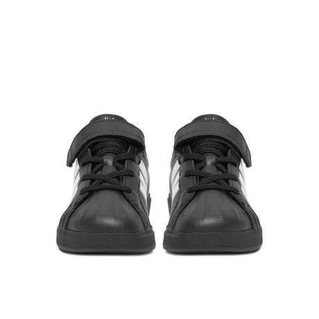 Sneakers adidas nere da bambino con tre strisce bianche e strappo