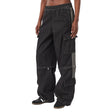 Pantalone cargo adidas in denim nero con cerniera trasformabile