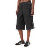 Pantalone cargo adidas in denim nero con cerniera trasformabile