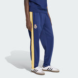 Pantaloni Adidas Originals Real Madrid blu navy con bande gialle laterali