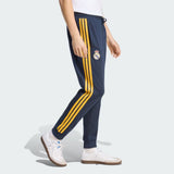 Pantaloni Adidas Real Madrid blu navy con bande gialle e polsino