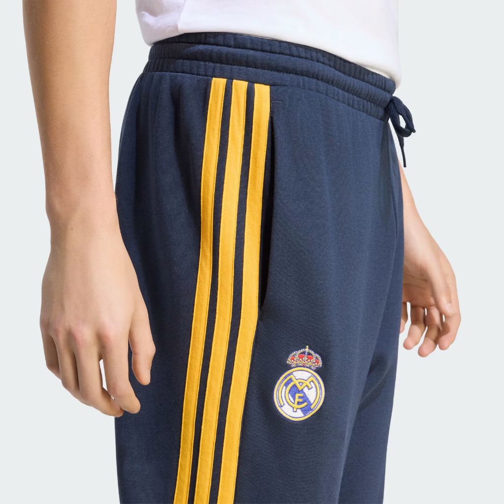 Pantaloni Adidas Real Madrid blu navy con bande gialle e polsino
