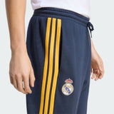 Pantaloni Adidas Real Madrid blu navy con bande gialle e polsino