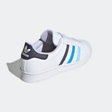 Sneaker adidas Superstar bianca con strisce sfumate blu