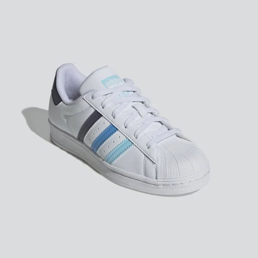 Sneaker adidas Superstar bianca con strisce sfumate blu