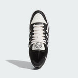 Sneaker adidas Rapid Court Low bianca e nera