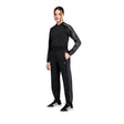 Tuta Adidas nera con giacca bomber corta e pantaloni con bande grigie