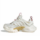 Adidas XLG Runner Deluxe bianco sporco con dettagli oro metallizzato e rosso