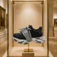 Sneaker Sacred nera con lacca animalier e suola vintage