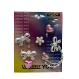 Set da 5 charm Jibbitz originali Crocs con fiocchi perlacei