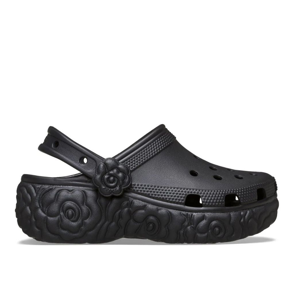 Zoccolo Crocs nero con zeppa, suola a motivo floreale