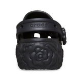 Zoccolo Crocs nero con zeppa, suola a motivo floreale