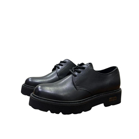 Derby Cult nera in pelle con suola platform