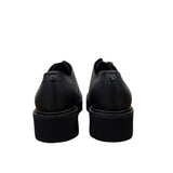 Derby Cult nera in pelle con suola platform