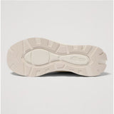 Sneakers da donna Ellesse Alba color beige e panna con tomaia in mesh e suede, suola spessa sagomata e lacci abbinati.
