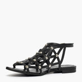 Sandalo gladiator Gagliotta in pelle nera, tomaia a gabbia con borchie argentate.