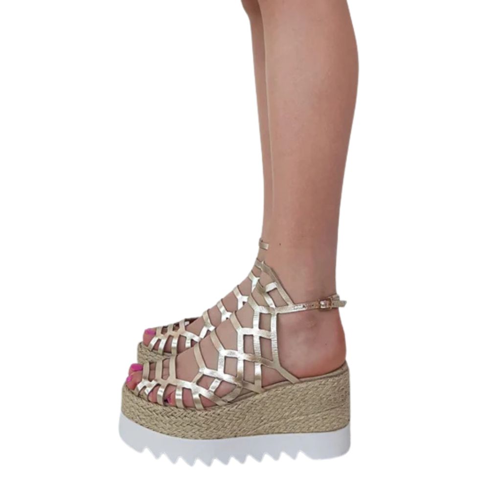 Sandalo gladiator zeppa corda 8,5 cm in pelle laminata oro