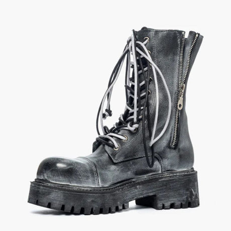 Anfibi Gagliotta nabuk nero spazzolato effetto vintage con doppio laccio bicolore e doppia zip laterale.