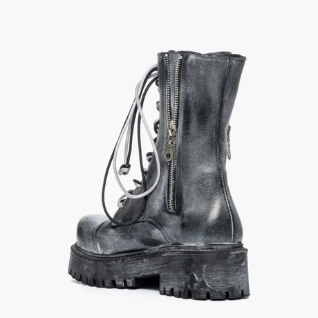 Anfibi Gagliotta nabuk nero spazzolato effetto vintage con doppio laccio bicolore e doppia zip laterale.