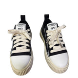 Sneaker Jammers London in canvas nero, punta bianca, suola platform 5 cm.