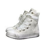 Stivaletto alto tela bianca vintage Jammers London, lacci oversize e platform consumata.