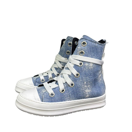 Sneaker alta in canvas denim light con lacci beige e suola bianca
