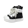 Stivaletto alto in tela nera Jammers London con lacci oversize bianchi, occhielli argento e suola platform bianca.