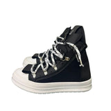 Sneaker high-top Jammers London in pelle nera, doppio laccio a contrasto, ganci argentati, suola platform bianca.