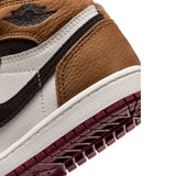 Sneakers Nike Air Jordan 1 High PS in bianco, marrone e nero con suola rossa