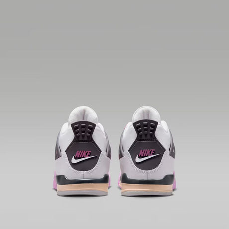 Sneakers Nike Air Jordan 4 PS bianche con dettagli rosa e rossi e suola lilla