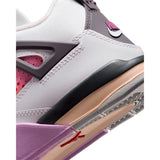 Sneakers Nike Air Jordan 4 PS bianche con dettagli rosa e rossi e suola lilla