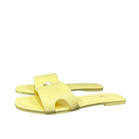 iabattine flat Marc Ellis ecopelle giallo lime con fascia cut-out laterale, logo stella