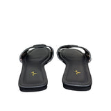 Ciabattine flat Marc Ellis ecopelle nera, placca logo nera opaca, plantare nero con logo oro.