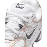 Sneakers Nike da bambino bianche con inserti argento