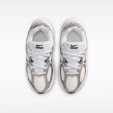 Sneakers Nike da bambino bianche con inserti argento