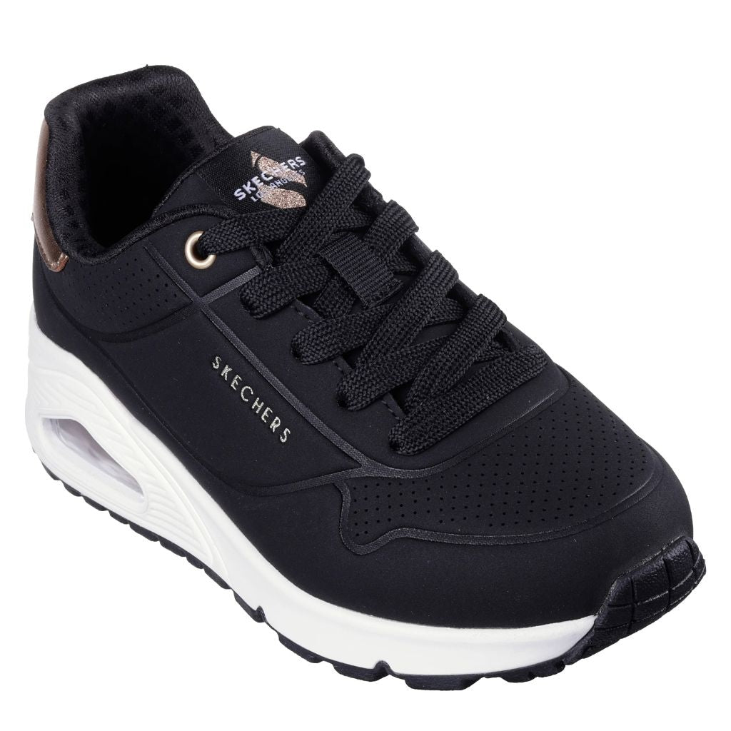 Sneaker Skechers Uno nera con intersuola bianca e dettaglio rose gold