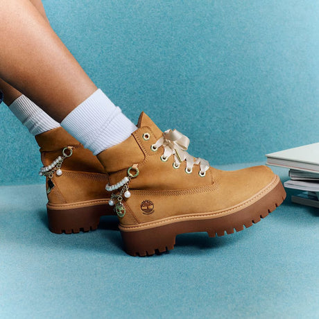 Stivale Timberland wheat con charm perle e suola platform