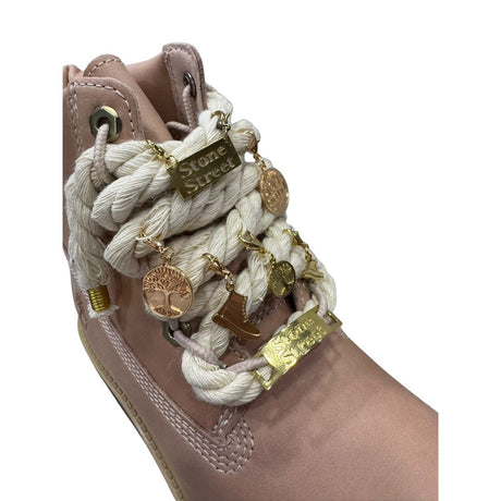 Scarponcino Timberland Stone Street rosa con lacci a corda e charms
